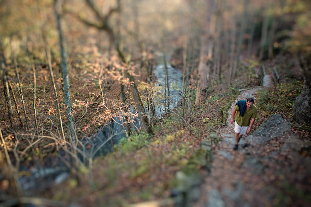 Hikers on a nature trail through George Rogers Clark Park in Springfield, Ohio